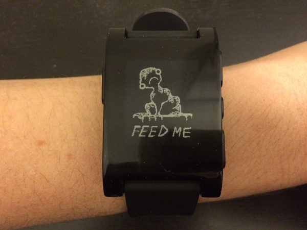 "Feed me" is displayed at the 30 min mark of an hour.
