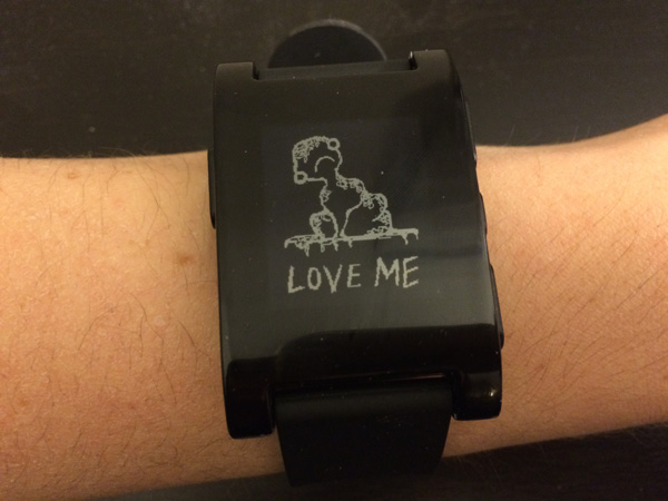 "Love me" is displayed every hour.